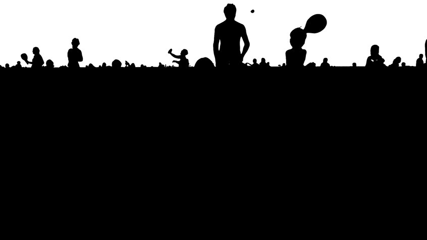 A back and white silhouette of people on the beach 